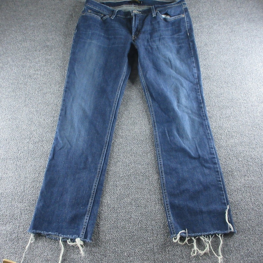Levis 524 Too Superlow Jeans Womens 15M Blue Low Rise Denim Raw Hem Medium Wash